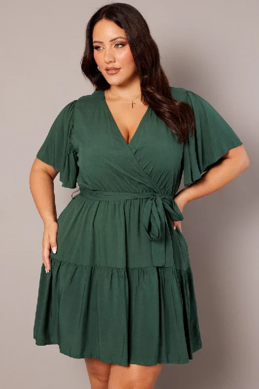 "Mermaid - style wedding dresses for women for a dramatic look"Green Wrapover Mini Dress Flare Sleeve Tie Waist